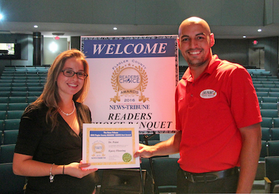 Dr. Paint's Omar and Katherine Rivera accept their award.